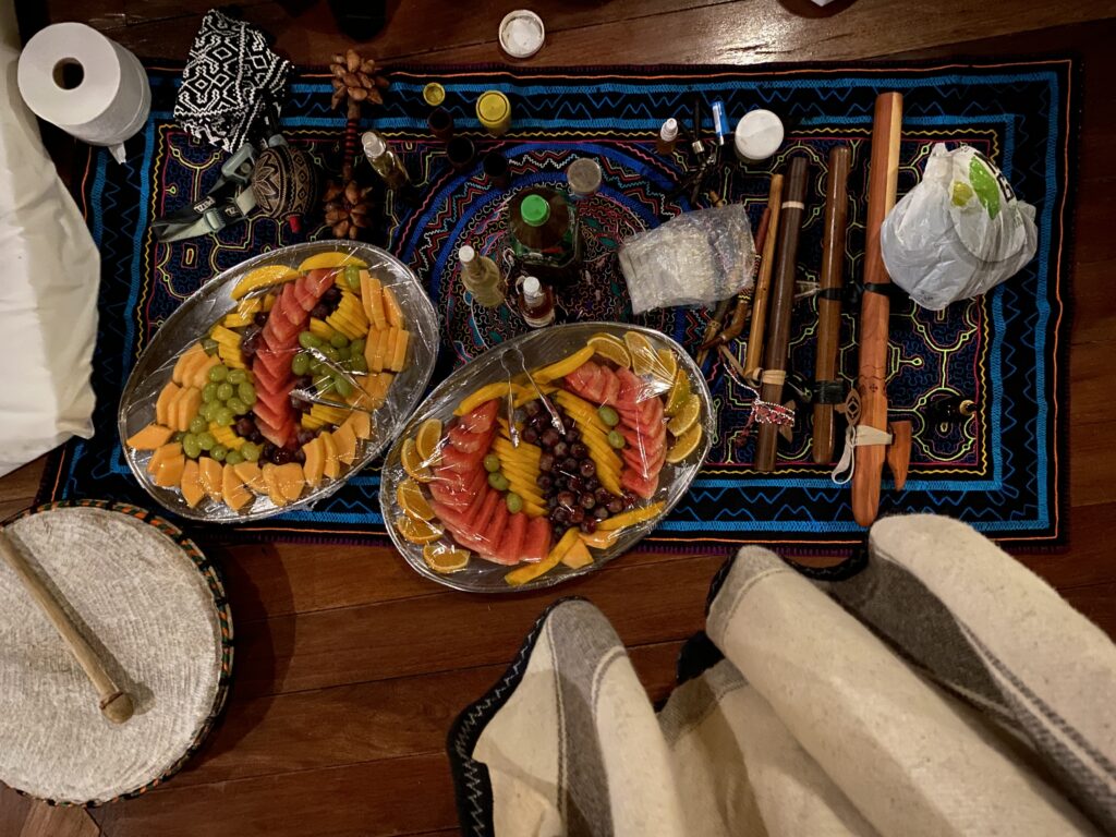 Fresh fruits, vegetables, and whole grains arranged on a table, showcasing foods suitable for the Ayahuasca diet.